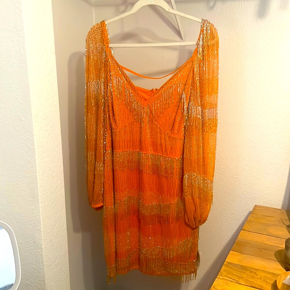 Never worn fully beaded orange dress, with original tags still attached.